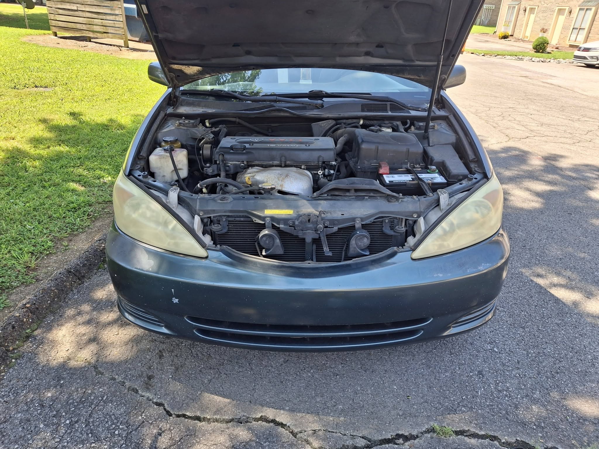 Engine bay opened up and ready for cleaning